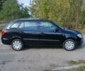 Черный Шкода Фабия, объемом двигателя 1.4 л и пробегом 230 тыс. км за 5000 $, фото 1 на Automoto.ua
