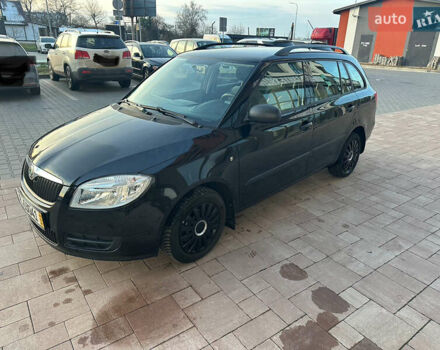 Черный Шкода Фабия, объемом двигателя 1.39 л и пробегом 222 тыс. км за 4750 $, фото 1 на Automoto.ua