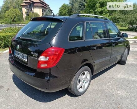 Черный Шкода Фабия, объемом двигателя 1.4 л и пробегом 142 тыс. км за 5450 $, фото 12 на Automoto.ua