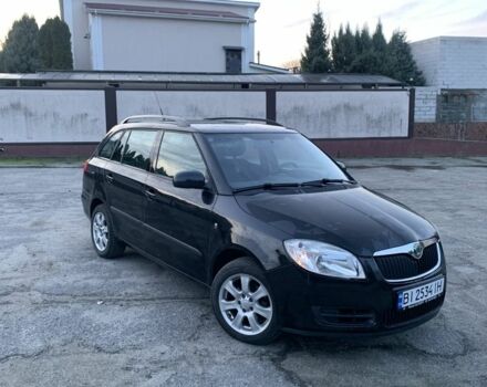 Черный Шкода Фабия, объемом двигателя 1.4 л и пробегом 228 тыс. км за 6999 $, фото 8 на Automoto.ua