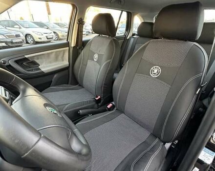 Черный Шкода Фабия, объемом двигателя 1.39 л и пробегом 172 тыс. км за 5999 $, фото 14 на Automoto.ua