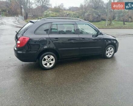 Черный Шкода Фабия, объемом двигателя 1.6 л и пробегом 192 тыс. км за 5800 $, фото 7 на Automoto.ua