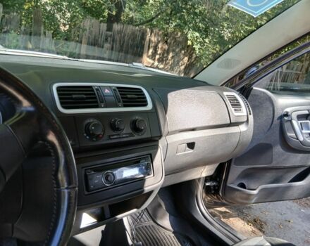 Черный Шкода Фабия, объемом двигателя 1.4 л и пробегом 124 тыс. км за 5400 $, фото 3 на Automoto.ua