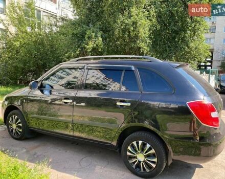 Черный Шкода Фабия, объемом двигателя 1.39 л и пробегом 210 тыс. км за 5300 $, фото 17 на Automoto.ua