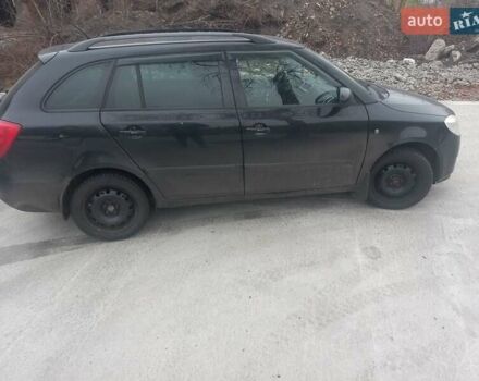 Черный Шкода Фабия, объемом двигателя 1.6 л и пробегом 211 тыс. км за 5500 $, фото 8 на Automoto.ua