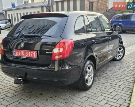 Черный Шкода Фабия, объемом двигателя 1.6 л и пробегом 163 тыс. км за 7700 $, фото 5 на Automoto.ua