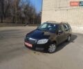 Черный Шкода Фабия, объемом двигателя 1.39 л и пробегом 172 тыс. км за 4850 $, фото 1 на Automoto.ua