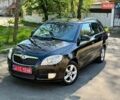 Черный Шкода Фабия, объемом двигателя 1.4 л и пробегом 218 тыс. км за 5700 $, фото 1 на Automoto.ua