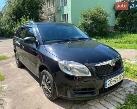 Черный Шкода Фабия, объемом двигателя 1.39 л и пробегом 210 тыс. км за 5300 $, фото 2 на Automoto.ua