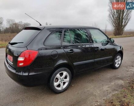 Черный Шкода Фабия, объемом двигателя 1.4 л и пробегом 201 тыс. км за 5750 $, фото 6 на Automoto.ua