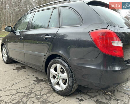 Черный Шкода Фабия, объемом двигателя 1.39 л и пробегом 202 тыс. км за 5750 $, фото 6 на Automoto.ua