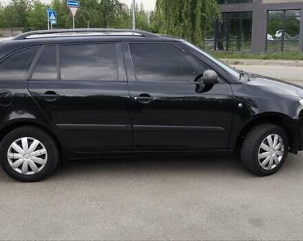 Черный Шкода Фабия, объемом двигателя 1.4 л и пробегом 425 тыс. км за 4750 $, фото 2 на Automoto.ua