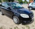 Черный Шкода Фабия, объемом двигателя 1.39 л и пробегом 258 тыс. км за 4800 $, фото 1 на Automoto.ua