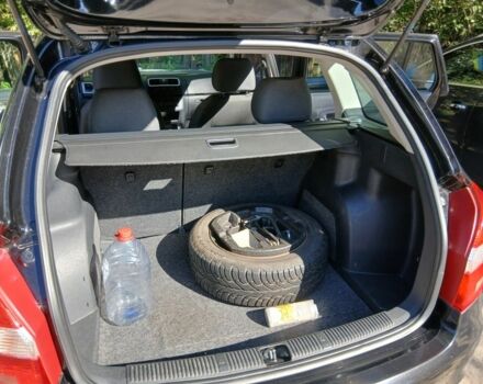 Черный Шкода Фабия, объемом двигателя 1.4 л и пробегом 124 тыс. км за 5400 $, фото 11 на Automoto.ua