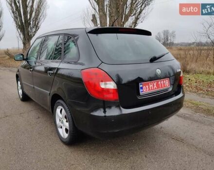 Черный Шкода Фабия, объемом двигателя 1.4 л и пробегом 201 тыс. км за 5750 $, фото 14 на Automoto.ua