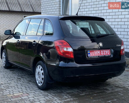 Черный Шкода Фабия, объемом двигателя 1.4 л и пробегом 295 тыс. км за 4350 $, фото 7 на Automoto.ua
