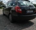 Черный Шкода Фабия, объемом двигателя 1.39 л и пробегом 255 тыс. км за 4400 $, фото 1 на Automoto.ua