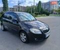 Черный Шкода Фабия, объемом двигателя 1.39 л и пробегом 247 тыс. км за 5200 $, фото 1 на Automoto.ua