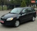 Черный Шкода Фабия, объемом двигателя 1.39 л и пробегом 173 тыс. км за 5000 $, фото 1 на Automoto.ua