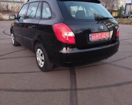 Черный Шкода Фабия, объемом двигателя 1.4 л и пробегом 197 тыс. км за 5800 $, фото 8 на Automoto.ua