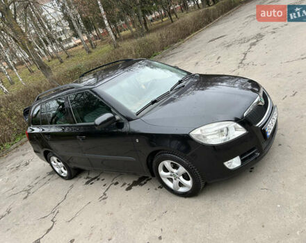 Черный Шкода Фабия, объемом двигателя 1.39 л и пробегом 202 тыс. км за 5750 $, фото 3 на Automoto.ua