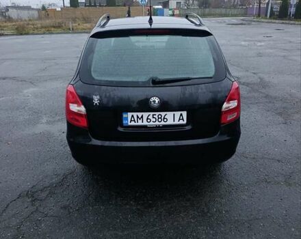 Черный Шкода Фабия, объемом двигателя 1.4 л и пробегом 205 тыс. км за 5999 $, фото 1 на Automoto.ua