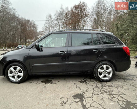 Черный Шкода Фабия, объемом двигателя 1.39 л и пробегом 202 тыс. км за 5750 $, фото 9 на Automoto.ua