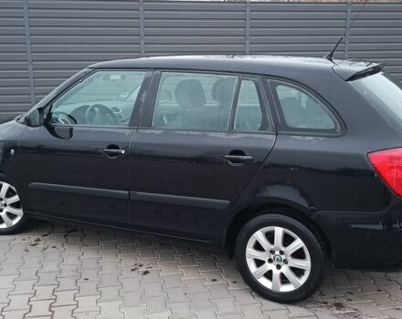 Черный Шкода Фабия, объемом двигателя 1.4 л и пробегом 200 тыс. км за 5200 $, фото 4 на Automoto.ua