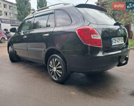Черный Шкода Фабия, объемом двигателя 1.39 л и пробегом 210 тыс. км за 5300 $, фото 3 на Automoto.ua