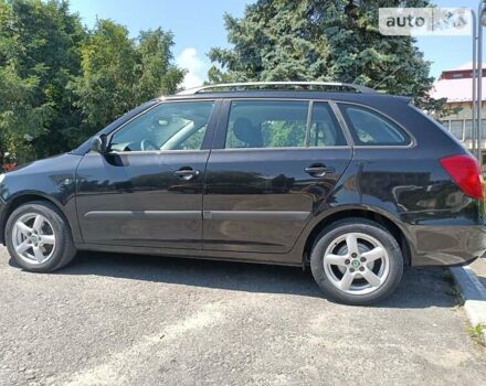 Черный Шкода Фабия, объемом двигателя 1.4 л и пробегом 142 тыс. км за 5450 $, фото 13 на Automoto.ua