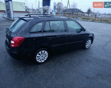 Черный Шкода Фабия, объемом двигателя 1.4 л и пробегом 205 тыс. км за 5999 $, фото 3 на Automoto.ua