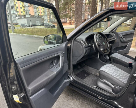 Черный Шкода Фабия, объемом двигателя 1.39 л и пробегом 161 тыс. км за 5550 $, фото 8 на Automoto.ua