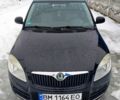 Черный Шкода Фабия, объемом двигателя 1.4 л и пробегом 210 тыс. км за 5700 $, фото 1 на Automoto.ua