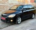 Черный Шкода Фабия, объемом двигателя 1.4 л и пробегом 234 тыс. км за 5500 $, фото 1 на Automoto.ua