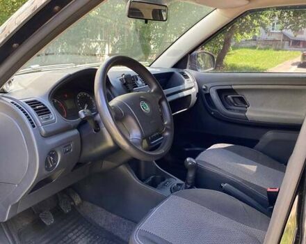 Черный Шкода Фабия, объемом двигателя 1.39 л и пробегом 210 тыс. км за 5300 $, фото 15 на Automoto.ua