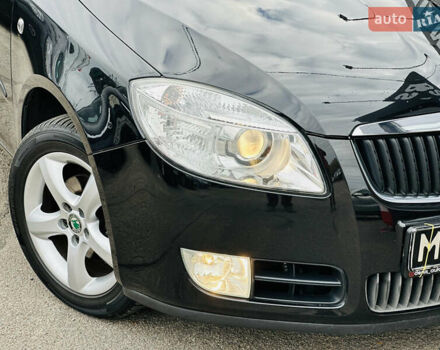 Черный Шкода Фабия, объемом двигателя 1.4 л и пробегом 175 тыс. км за 6300 $, фото 2 на Automoto.ua