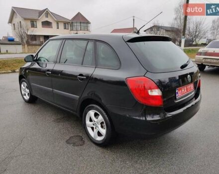 Черный Шкода Фабия, объемом двигателя 1.4 л и пробегом 201 тыс. км за 5750 $, фото 7 на Automoto.ua