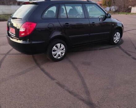 Черный Шкода Фабия, объемом двигателя 1.4 л и пробегом 197 тыс. км за 5800 $, фото 11 на Automoto.ua