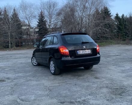 Черный Шкода Фабия, объемом двигателя 1.4 л и пробегом 228 тыс. км за 6999 $, фото 3 на Automoto.ua