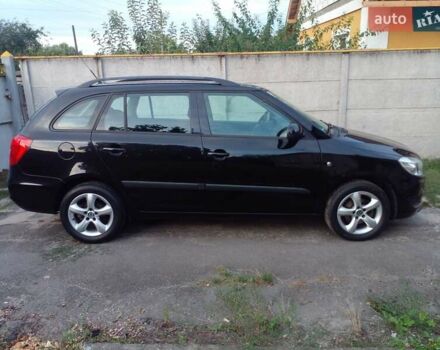 Черный Шкода Фабия, объемом двигателя 1.2 л и пробегом 170 тыс. км за 5400 $, фото 4 на Automoto.ua