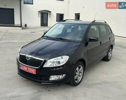 Шкода Фабия 2010 в Луцке на Automoto.ua Черный Шкода Фабия, объемом двигателя 1.2 л и пробегом 141 тыс. км за 6850 $, фото 2 на Automoto.ua