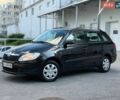 Черный Шкода Фабия, объемом двигателя 1.39 л и пробегом 229 тыс. км за 5599 $, фото 1 на Automoto.ua