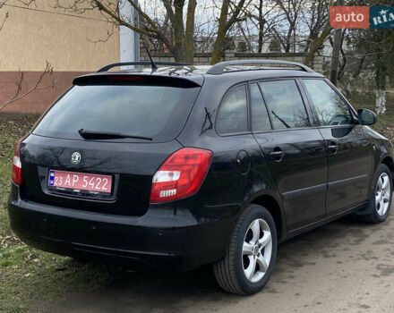 Черный Шкода Фабия, объемом двигателя 1.6 л и пробегом 197 тыс. км за 6100 $, фото 6 на Automoto.ua