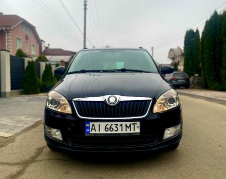 Черный Шкода Фабия, объемом двигателя 1.2 л и пробегом 243 тыс. км за 5300 $, фото 1 на Automoto.ua