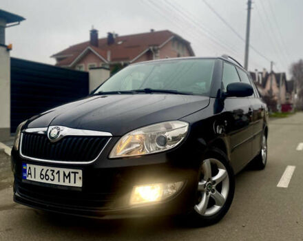 Черный Шкода Фабия, объемом двигателя 1.2 л и пробегом 243 тыс. км за 5300 $, фото 2 на Automoto.ua