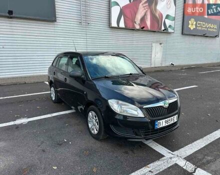 Черный Шкода Фабия, объемом двигателя 1.6 л и пробегом 195 тыс. км за 5500 $, фото 2 на Automoto.ua