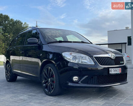 Черный Шкода Фабия, объемом двигателя 1.4 л и пробегом 179 тыс. км за 7750 $, фото 7 на Automoto.ua
