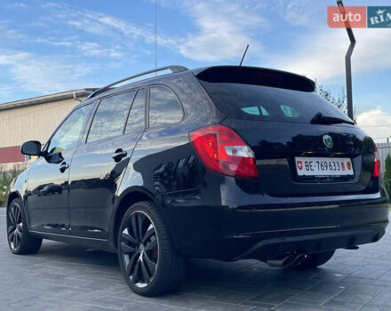 Черный Шкода Фабия, объемом двигателя 1.4 л и пробегом 179 тыс. км за 7750 $, фото 14 на Automoto.ua