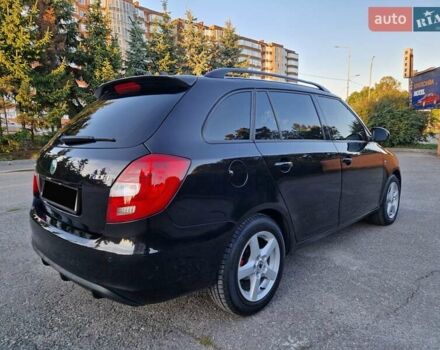 Черный Шкода Фабия, объемом двигателя 1.4 л и пробегом 225 тыс. км за 8600 $, фото 2 на Automoto.ua