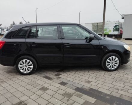 Черный Шкода Фабия, объемом двигателя 1.2 л и пробегом 210 тыс. км за 5250 $, фото 1 на Automoto.ua